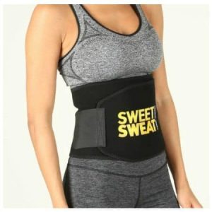 Model with Sweet Sweat slimming belt on white background.