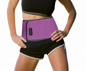 Model with purple waist trimmer belt on white background.