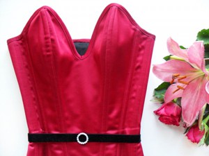 A red satin overbust corset