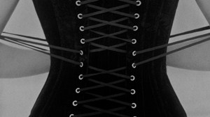 a woman wearing a black corset