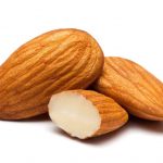 Closeup of almonds, isolated on the white background, clipping path included.