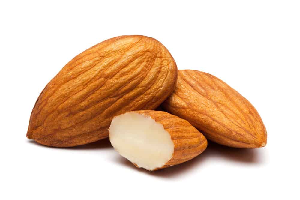 Closeup of almonds, isolated on the white background, clipping path included.