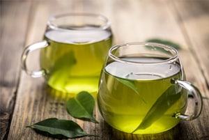 Green tea on the wooden table