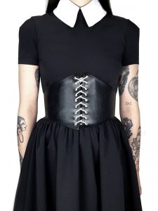 Tattoo girl wearing a leather corset belt dress