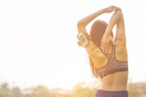 Women exercising in sunny bright light.