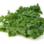 Kale leafs on white background.
