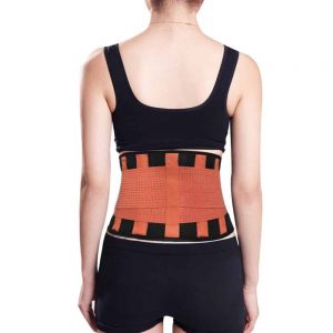 Woman wearing orange medical corset