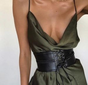 Corset belt over a sexy dress