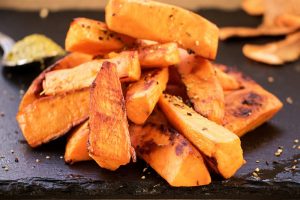 Sweet potato pieces on slate plate