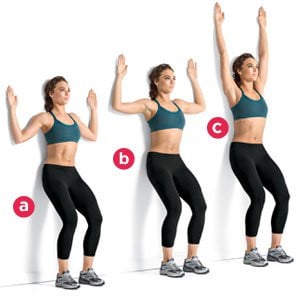 Woman showing wall slide exercise 